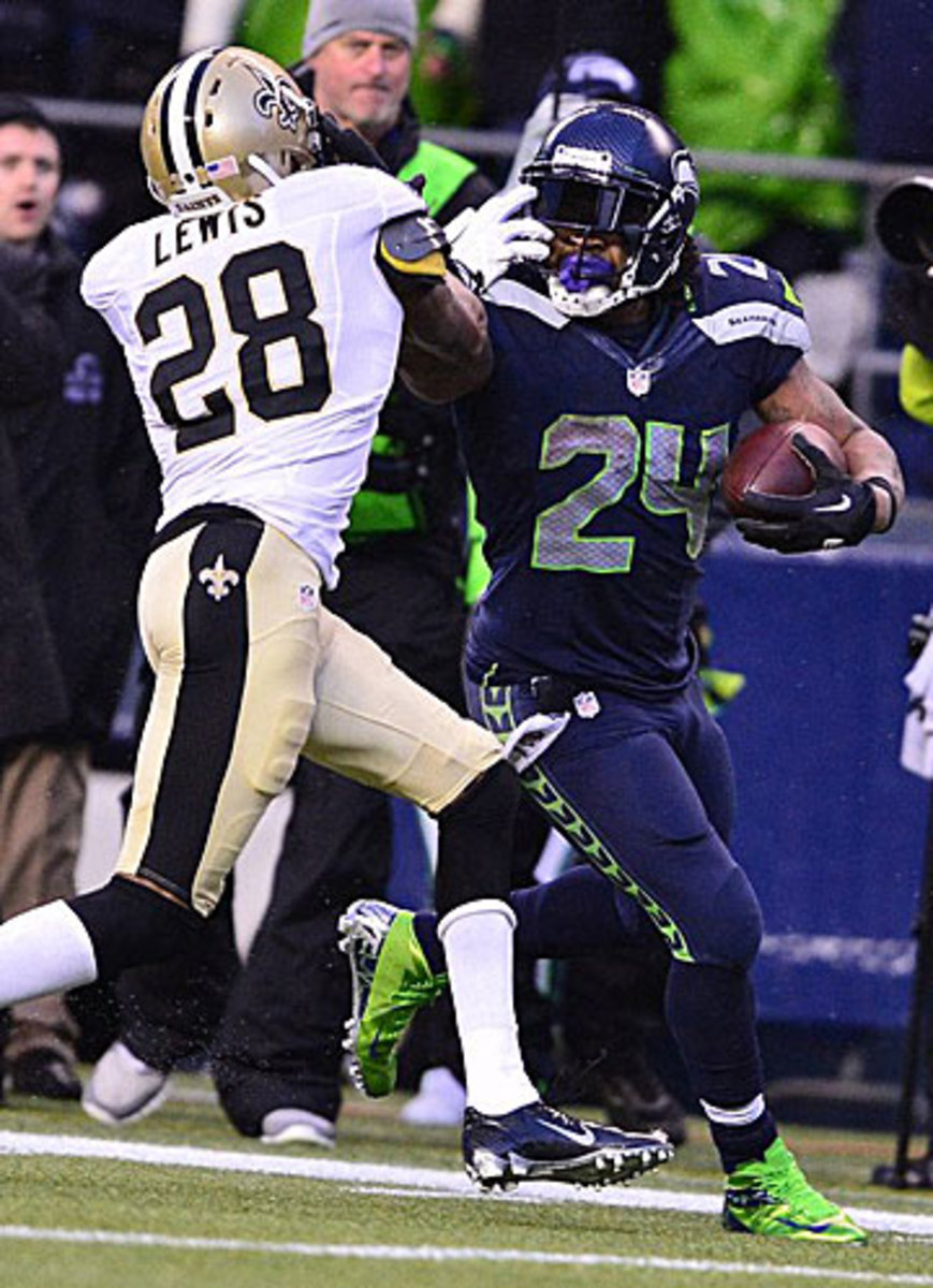 Marshawn Lynch, master of the stiff arm. (Robert Beck/SI)