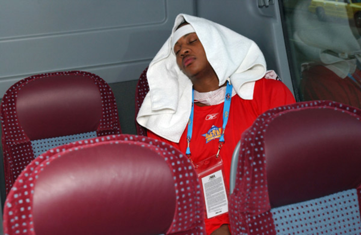 Carmelo Anthony sleeps on the bus on the way to the Sophomore Team Practice during NBA All-Star Weekend in February 2005.