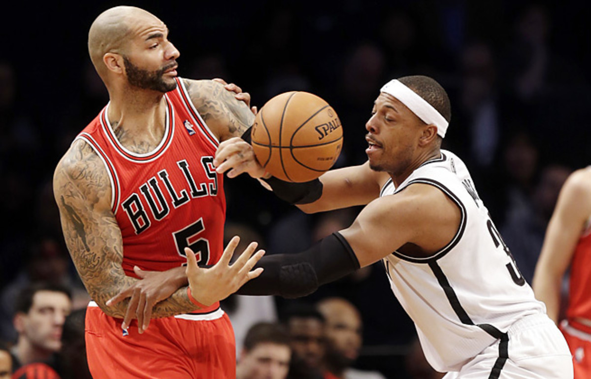 Carlos Boozer and the Bulls were held to 80 points in a loss to the surging Nets and Paul Pierce.