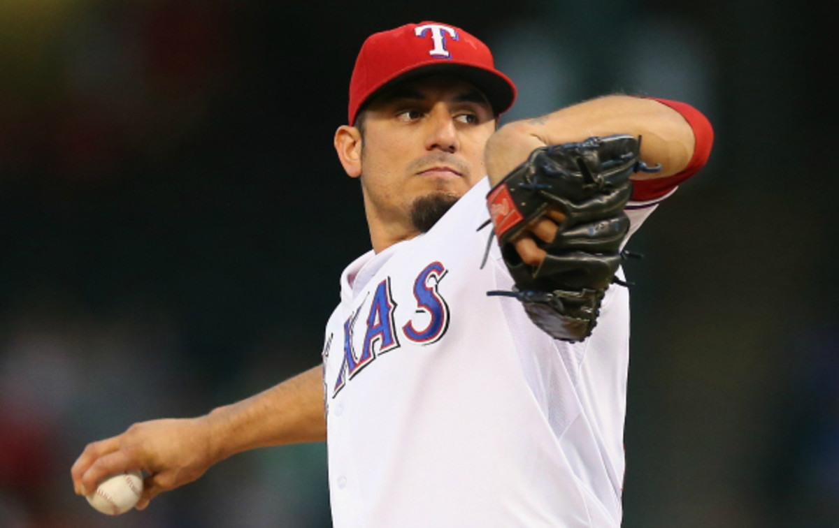 Matt Garza spent the second half of the 2013 season with Texas after being traded by the Chicago Cubs. (Ronald Martinez/ Getty Images)
