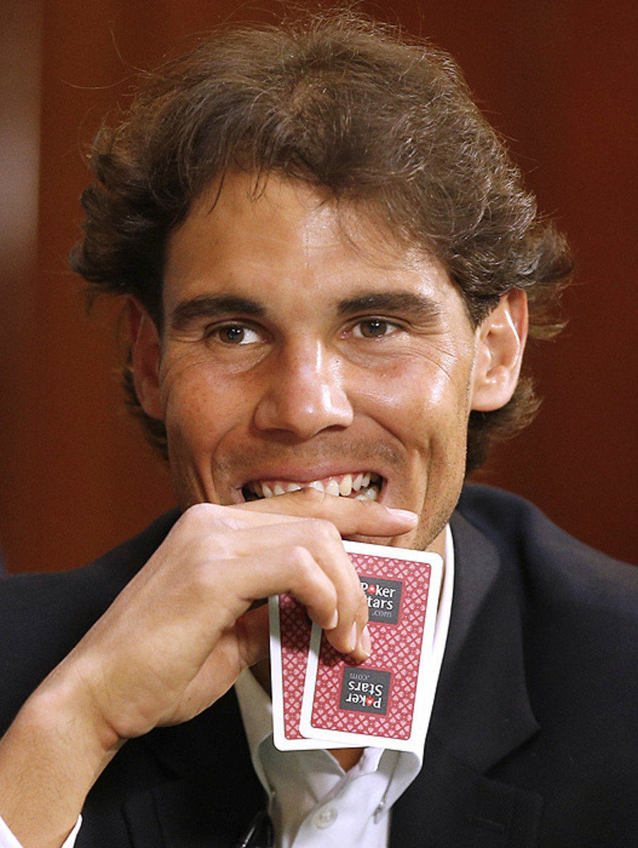 Rafael Nadal's poker face is just plain horrible. (VALERY HACHE/AFP/Getty Images)