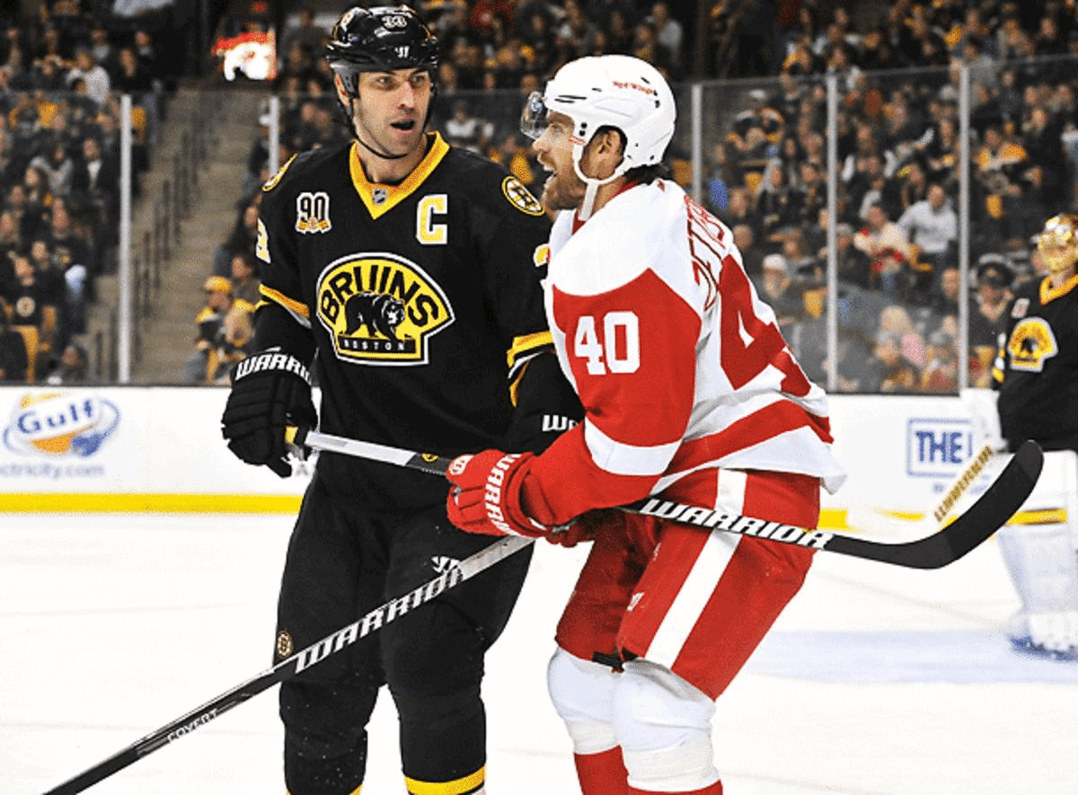 Zdeno Chara (left) and Henrik Zetterberg remain friendly off the ice, but that may be on pause this week. (Michael Tureski/Icon SMI)