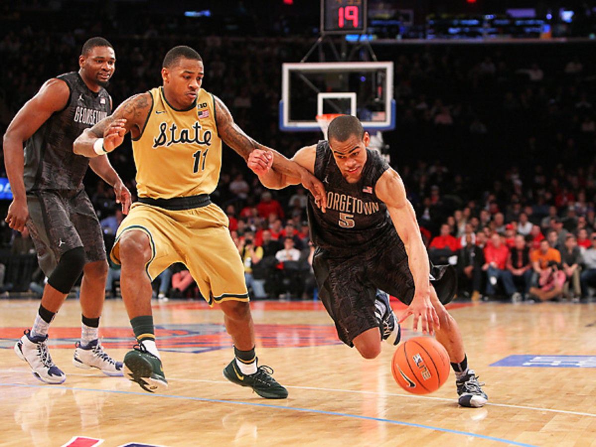 Georgetown's Markel Starks drives to the basket during the Hoyas' upset win over Michigan State. (Nate Shron/Getty Images)