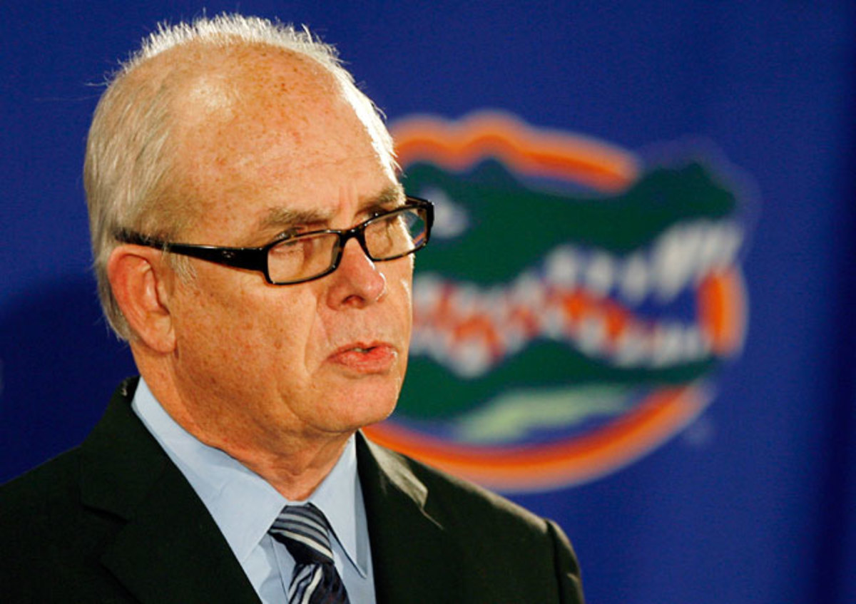 Univ. of Florida president Bernie Machen said athletic departments are between 'a rock and a hard place.'