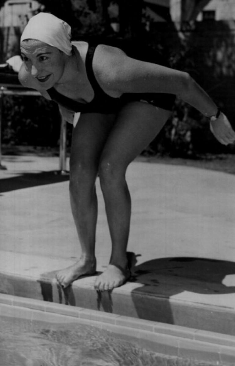 MAY 31 1953; Chadwick, Florence; Florence Chadwick, who holds the women's record for swimming the English channel, isn't letting her work as a cross-country tour for a swim suit company interfere with her training for future swims. She spends four hours each day tied on the end of a rope to simulate swimming against currents and Saturday she worked out at the Town Club here. Her schedule for this summer includes tries in the Dardanelles on July 18, the straits of Gibraltar on July 30 and another try in the English Channel on Aug. 16.