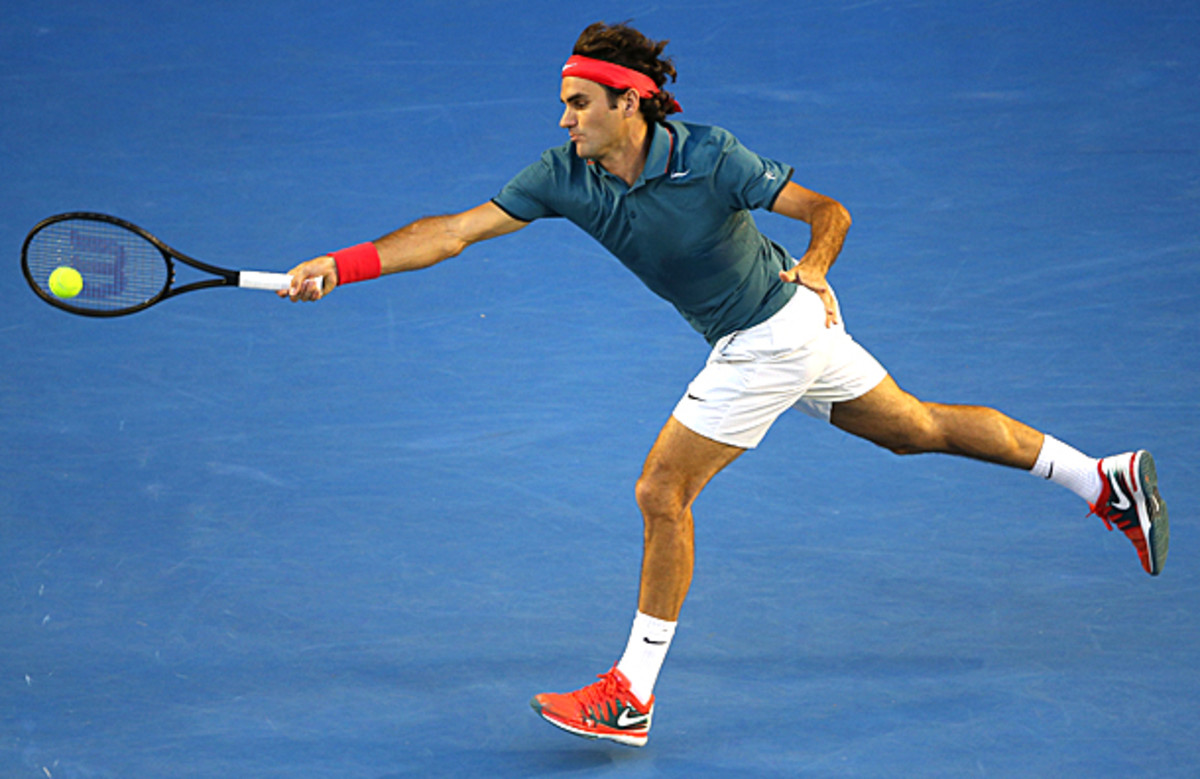 Roger Federer came within two points of winning the match in the third set, but he closed it out in the fourth set. (Clive Brunskill/Getty Images)
