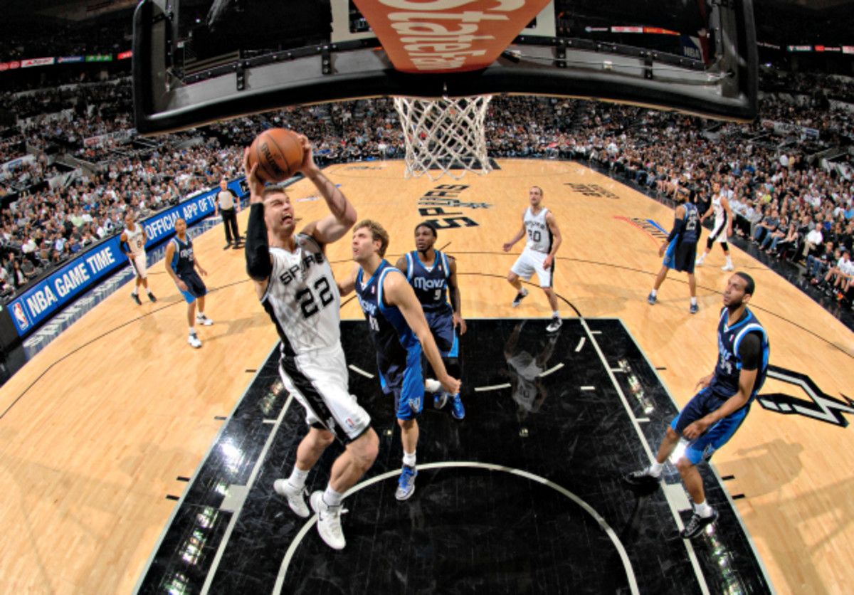 Tiago Splitter and the Spurs diced the Mavs in the pick-and-roll. (D. Clarke Evans/NBAE via Getty Images)