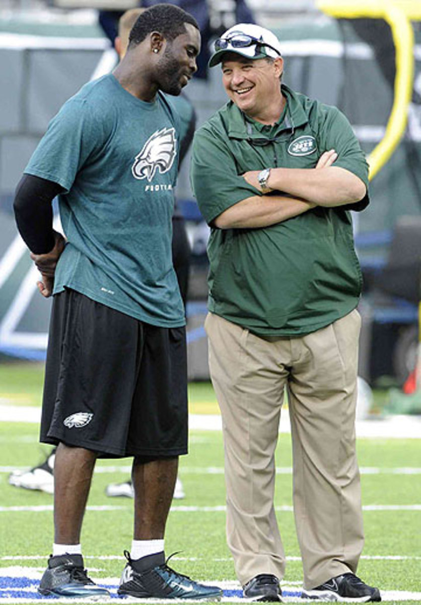 Michael Vick and Marty Mornhinweg previously worked together in Philly. (Bill Kostroun/AP)