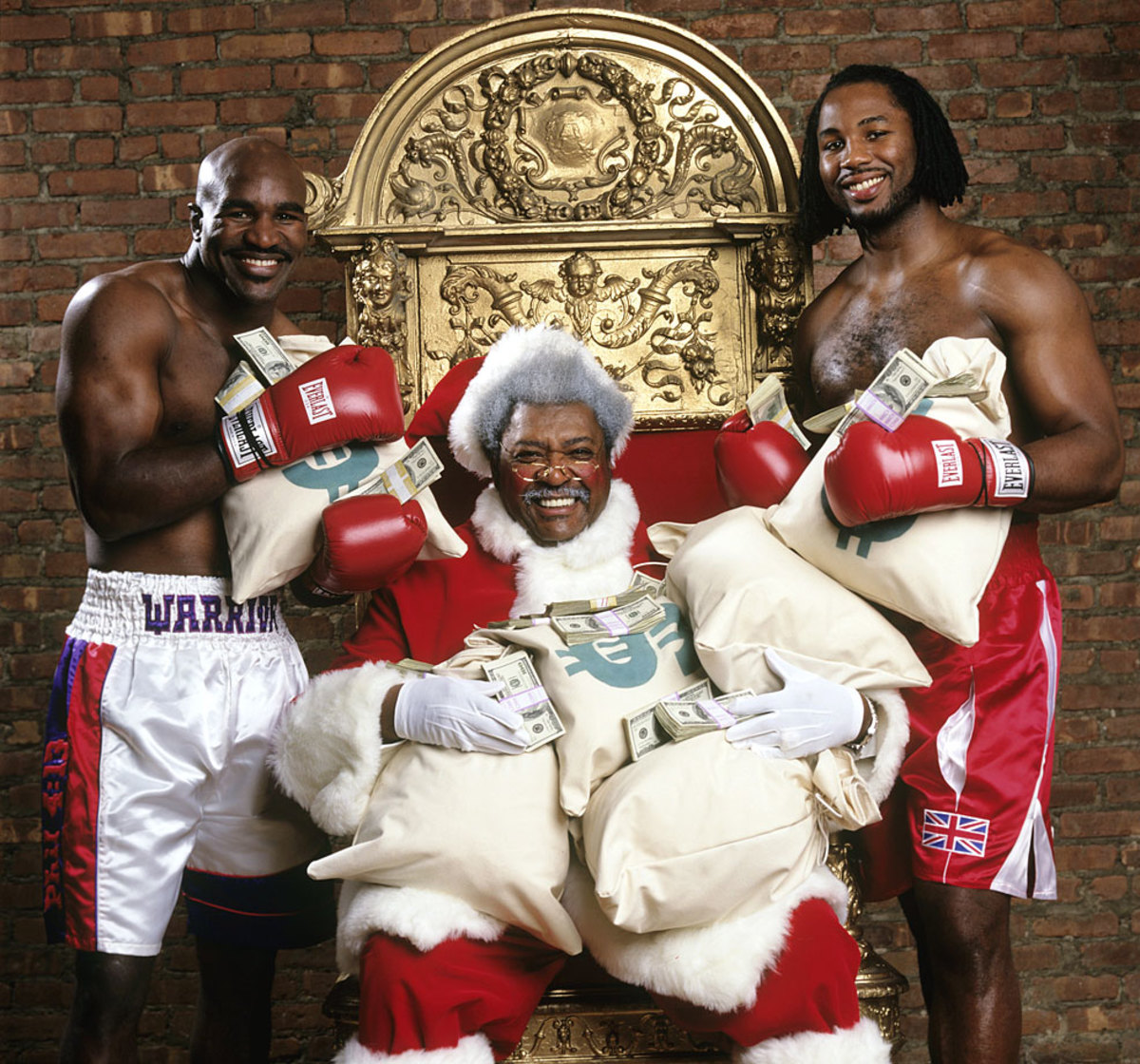 don-king-santa-evander-holyfield-lennox-lewis.jpg