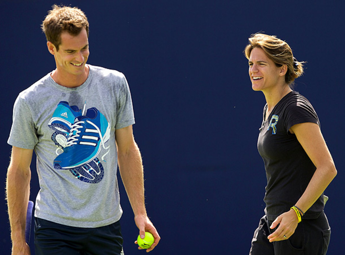 Andy Murray practices with his newly-appointed coach Amelie Mauresmo in the Queen's Club. (ANDREW COWIE/AFP/Getty Images)