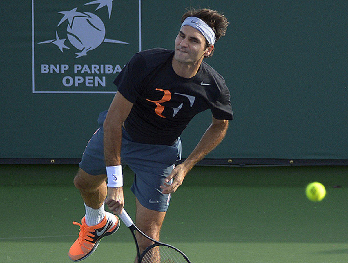 Roger Federer will join forces with Stanislas Wawrinka in the doubles draw at Indian Wells. (Mark J. Terrill/AP)