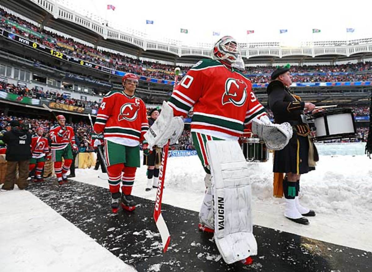 Martin Brodeur leads the New Jersey Devils into Yankee Stadium for their NHL outdoor game vs. the New York Rangers.