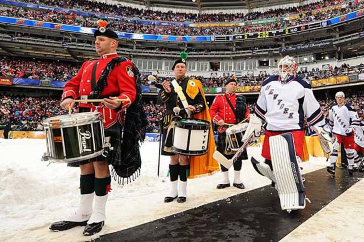 Drums and bagpipes play at the NHL outdoor game at Yankee Stadium