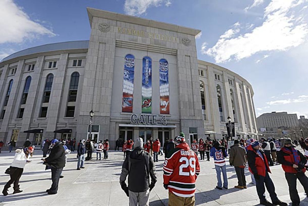 Fans arriving at Yankee Stadium for Devils-Rangers outdoor game.