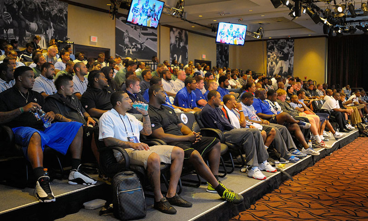 Rookies at the symposium, shown here in 2013, face long days of lectures, with various former players heading up each session. (John McDonnell/The Washington Post/Getty Images)