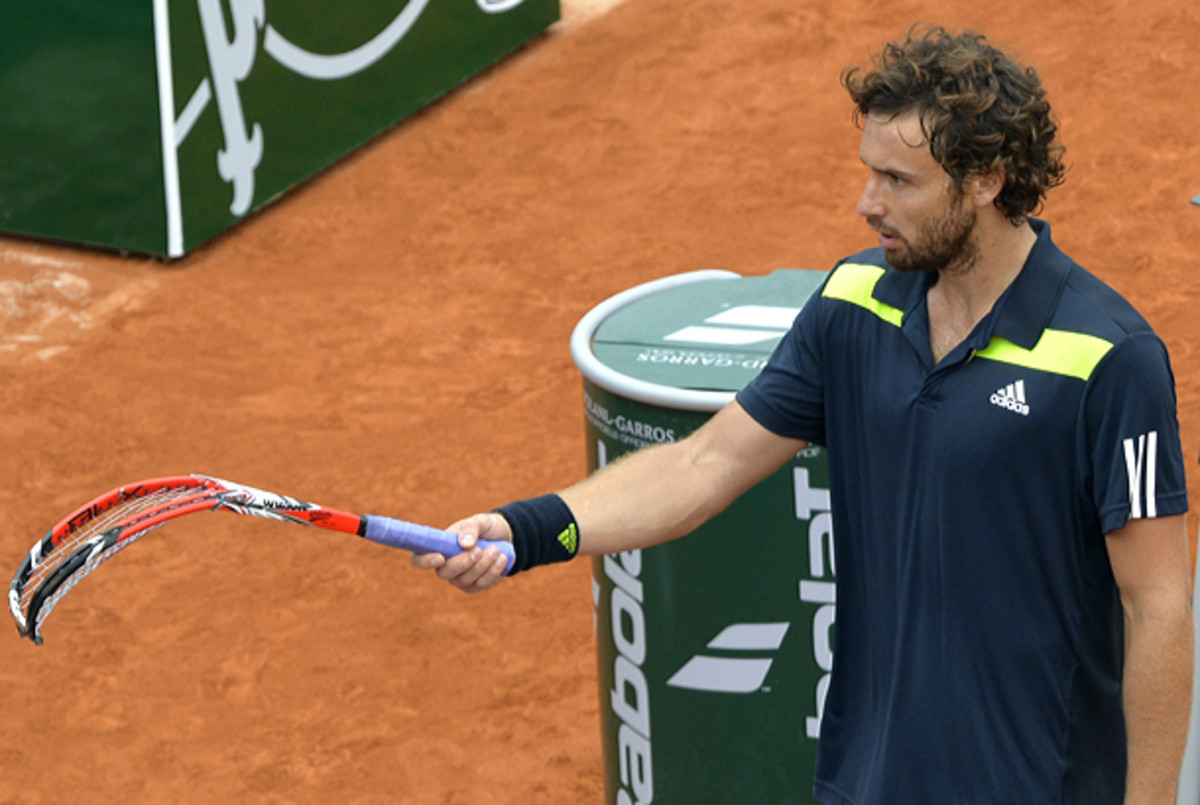 Ernests Gulbis smashing rackets is a regular thing. (MIGUEL MEDINA/AFP/Getty Images)
