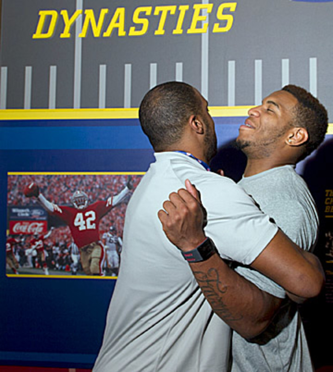 Ebron, the most outspoken rookie in the NFC group, is on the receiving end of a hug from fellow Lions rookie Larry Webster. (Phil Long/AP)