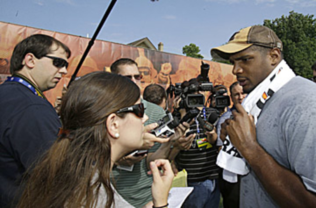 Not surprisingly, Michael Sam was a popular man during media availability during Tuesday's outing. (Tony Dejak/AP)