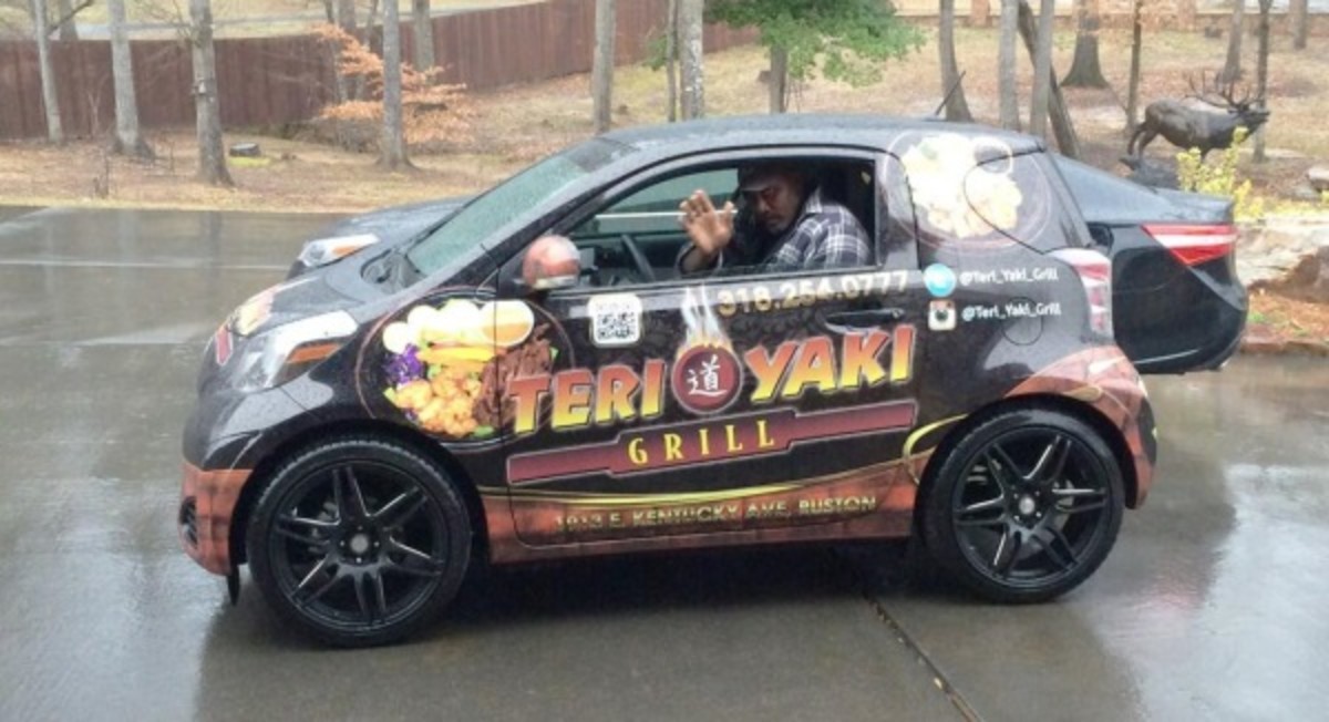 Utah Jazz legend Karl Malone struggles to fit inside smart car Sports