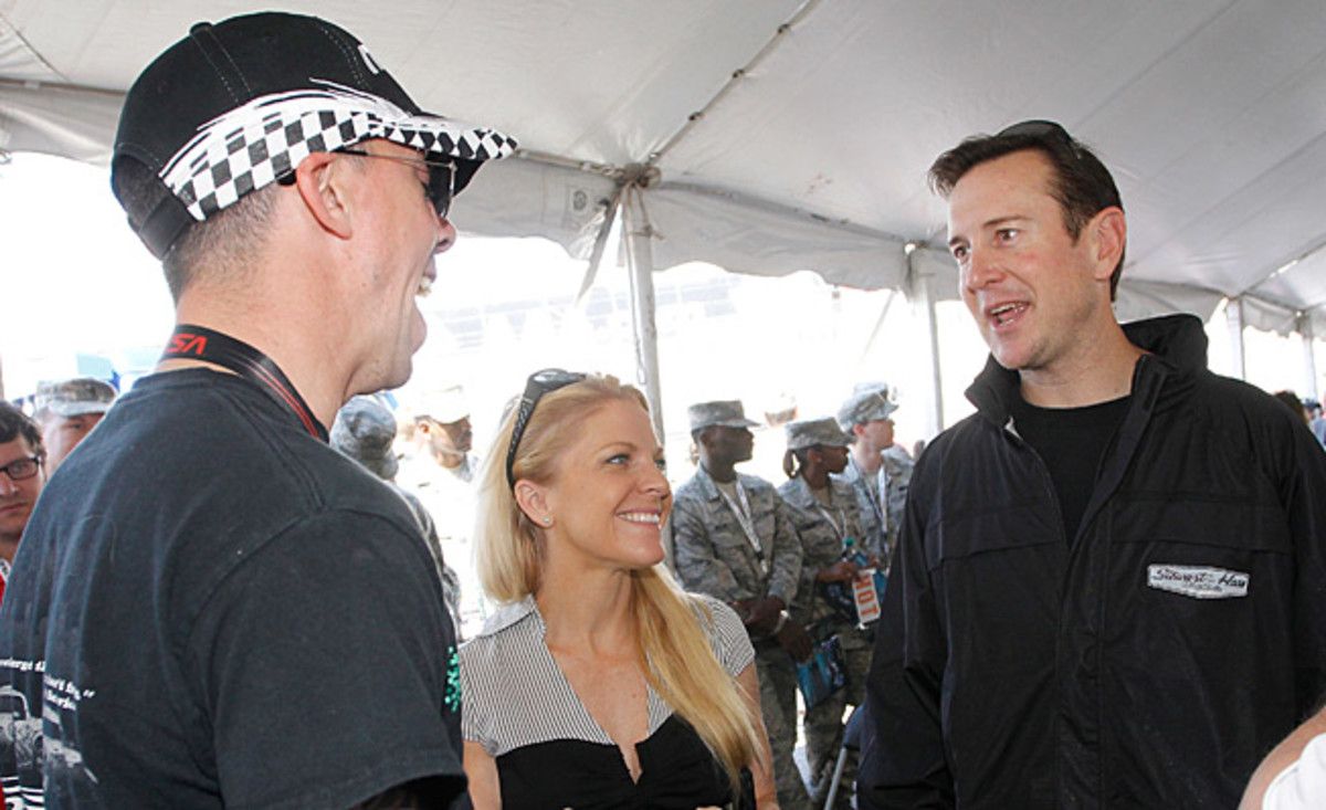 Kurt Busch (right) and girlfriend Patricia Driscoll met up with Marine Sgt. Liam Dwyer at Dover.