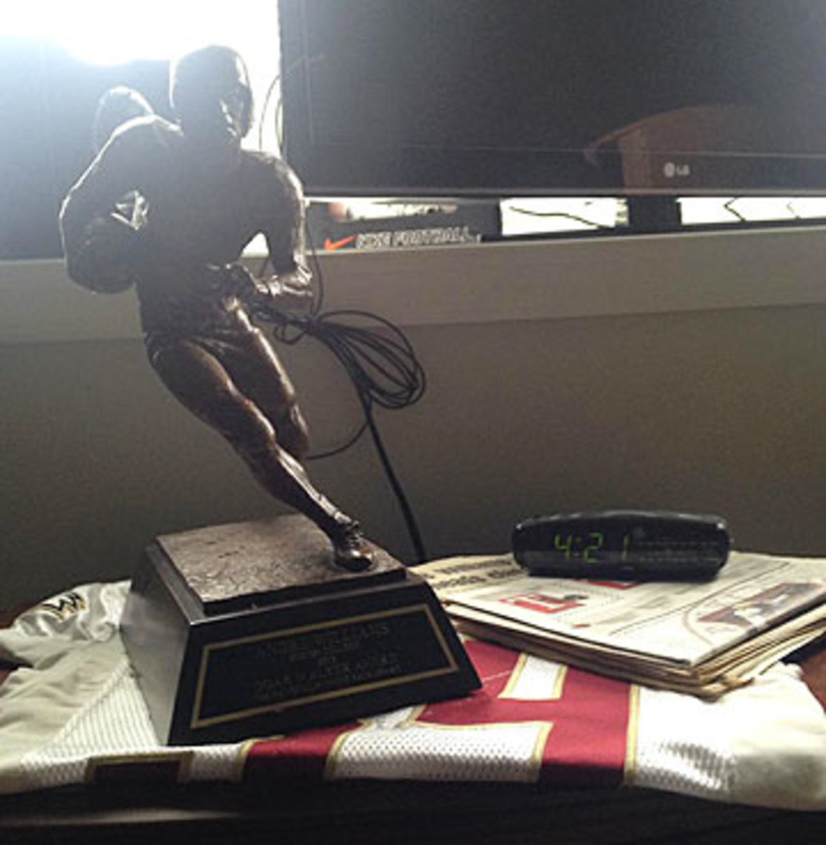 The Doak Walker trophy, given to college football's top running back, sits on Williams' nightstand at his childhood home in Pennsylvania.