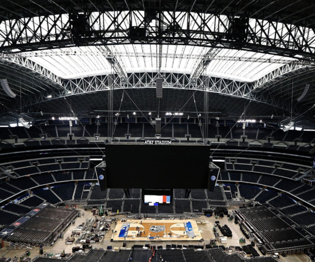 Workers assemble the NCAA's Final Four floor at AT&T stadium in Arlington, Texas (Ron Jenkins/Fort Worth Star-Telegram/MCT via Getty Images).