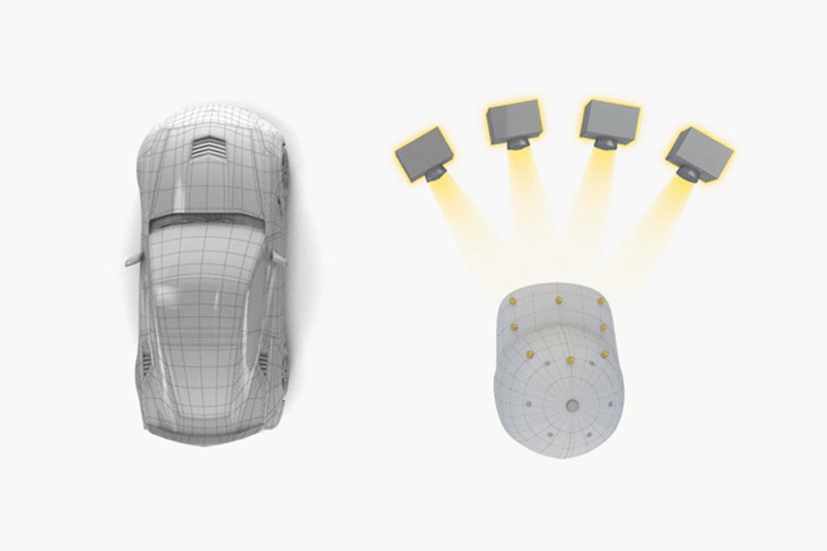 The driver wears a racing hat fitted with eight infrared sensors. Inside the car, four infrared cameras are mounted facing the driver. The cameras and sensors integrate into a system that can motion-track the driver’s subtle head movements in real time.