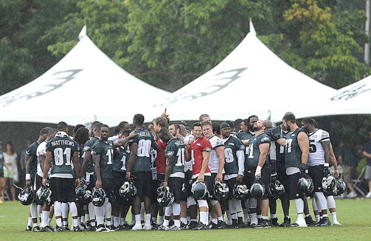 The Eagles worked through the rain on Saturday. (Michael Perez/AP)