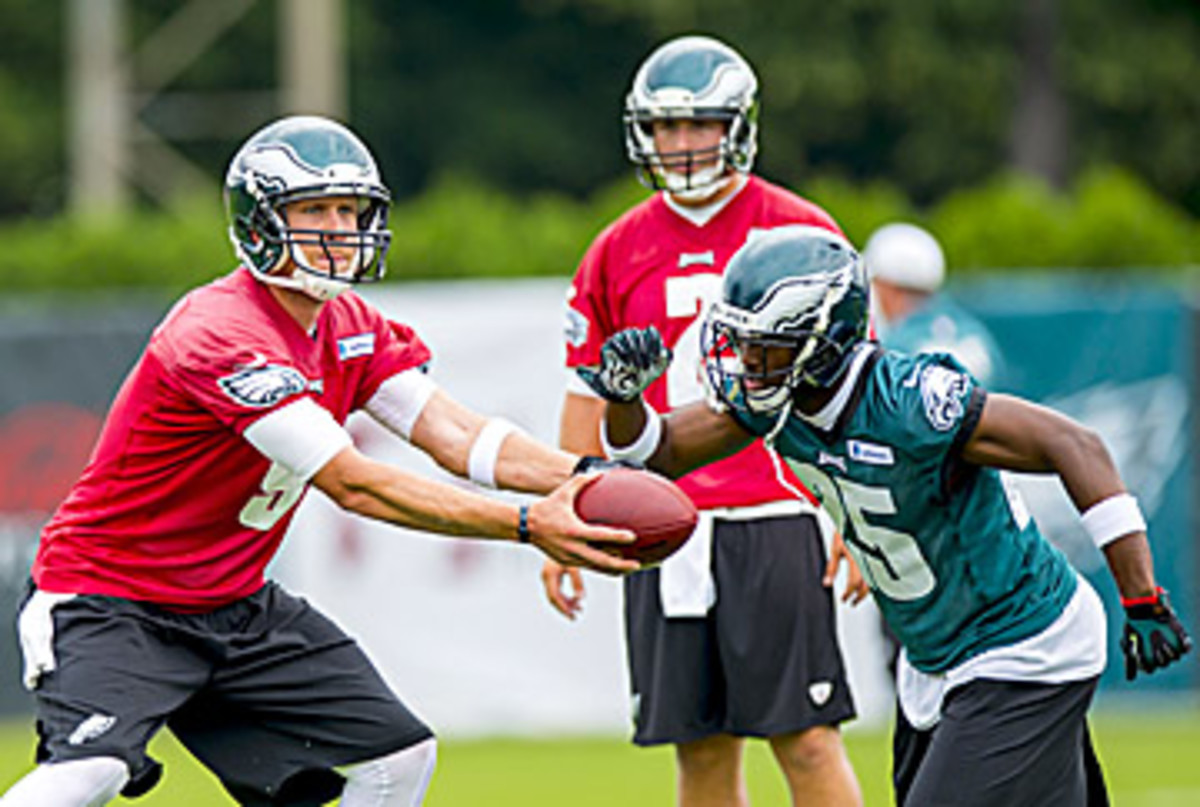 Foles hands off to McCoy. The two will do plenty of damage in Kelly's offense again. (Gavin Baker/Icon SMI)
