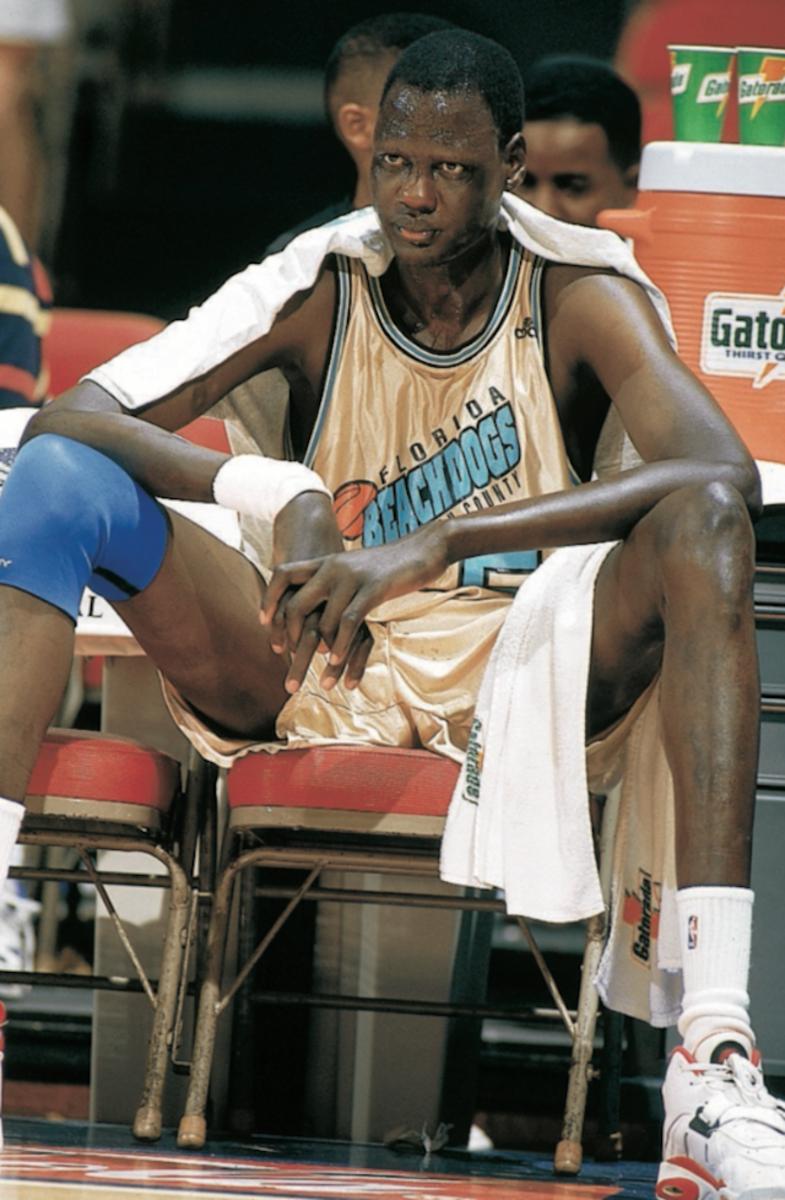 Florida Beachdogs Manute Bol (50) on bench during game vs Sioux Falls Skyforce at Palm Beach Auditorium. Continental Basketball Association.