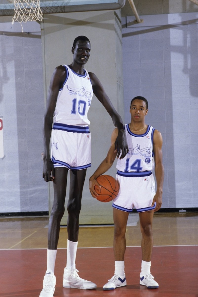 Rhode Island Gulls Manute Bol (10) and Spud Webb (14) during photo shoot before game vs Westchester Golden Apples at Rogers High School Gym. United States Basketball League.