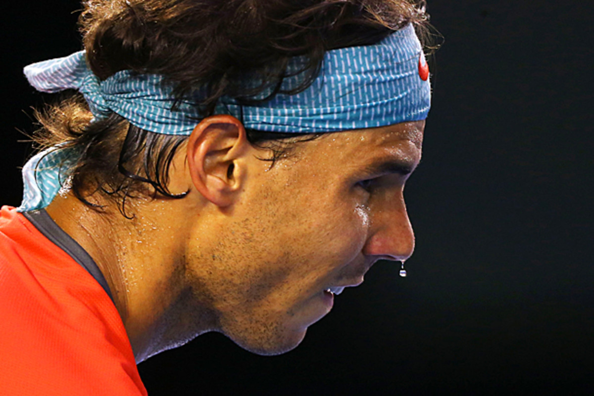 It's quite cool outside in Melbourne, but of course Rafael Nadal is dripping sweat. (Quinn Rooney/Getty Images)