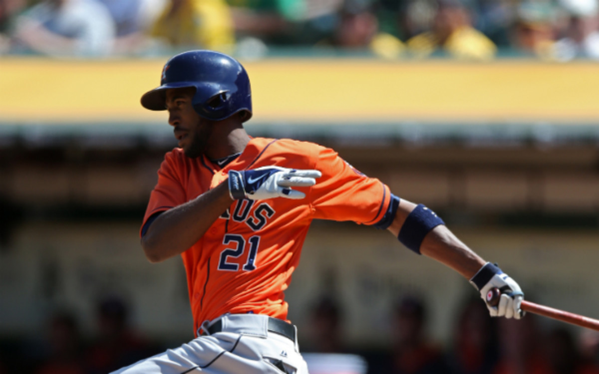 Dexter Fowler has been working on his swing with Barry Bonds. (Brad Mangin/Getty Images)
