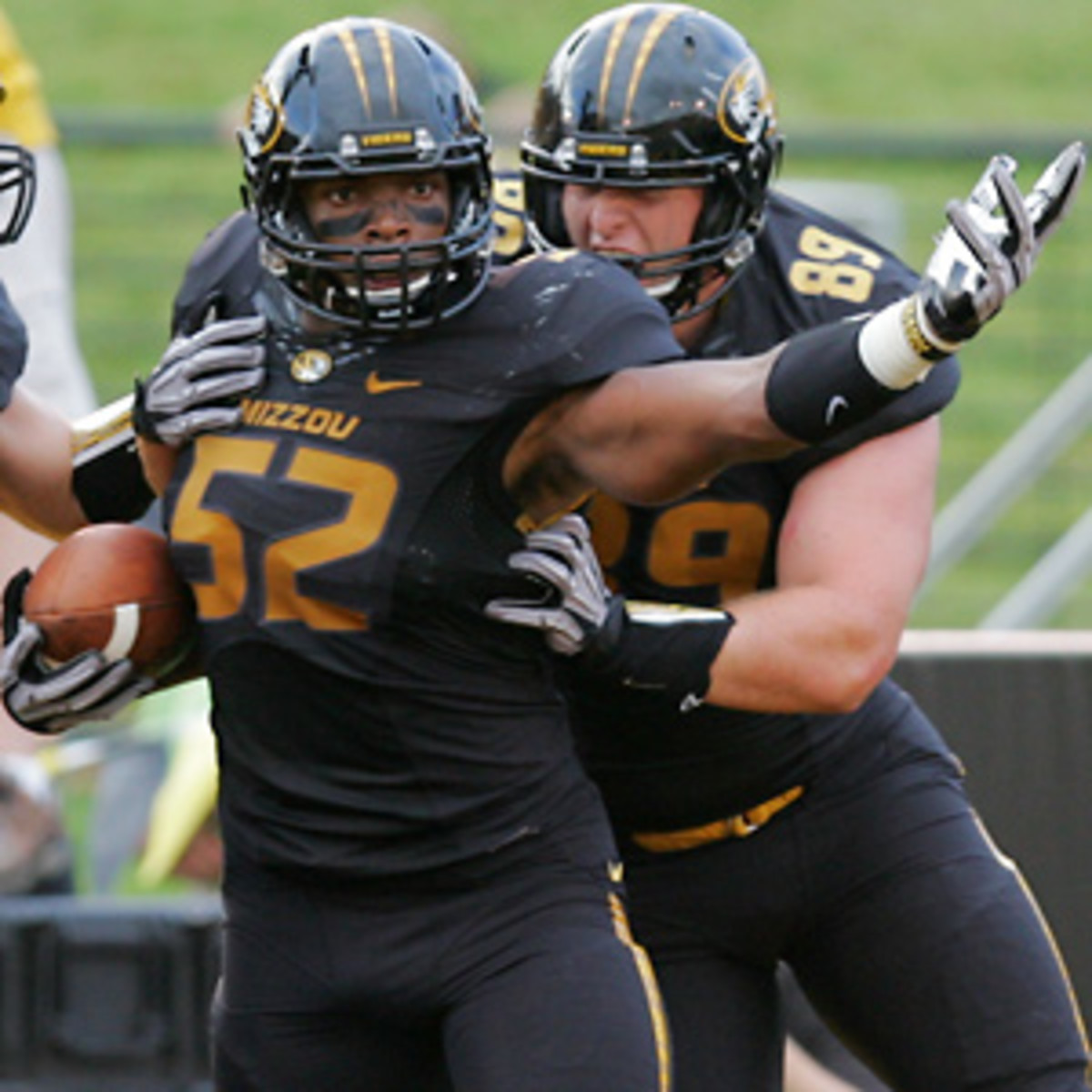 Michael Sam (52) was a unanimous first-team All-America selection by both the AP and the Football Writers Association of America.