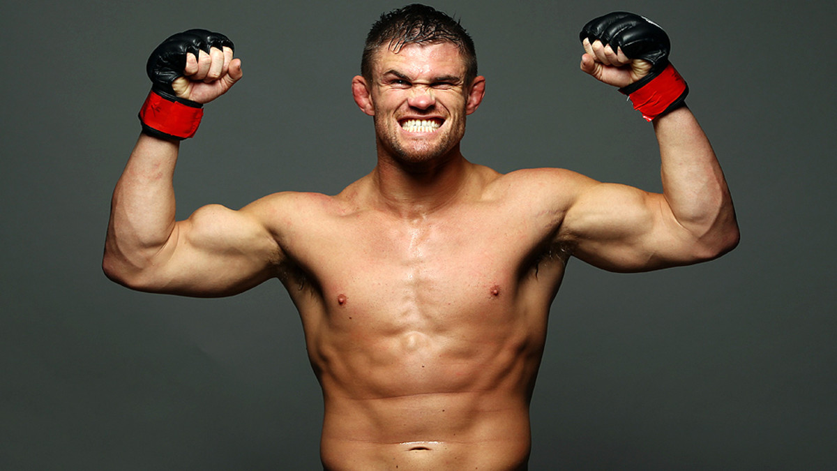 Video UFC fighter Daron Cruickshank fires gun at his cup to test it