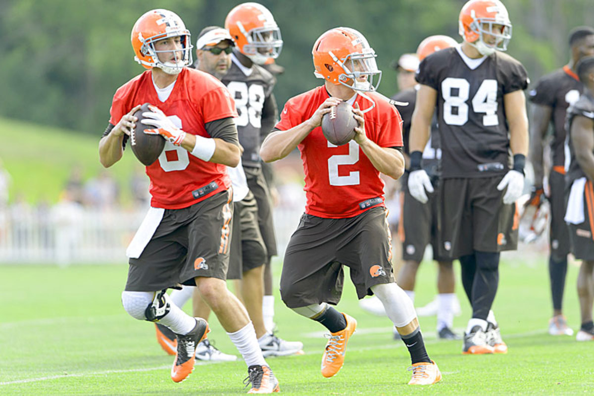Brian Hoyer (l.) Johnny Manziel at Browns camp on Saturday. (Jason Miller/Getty Images)