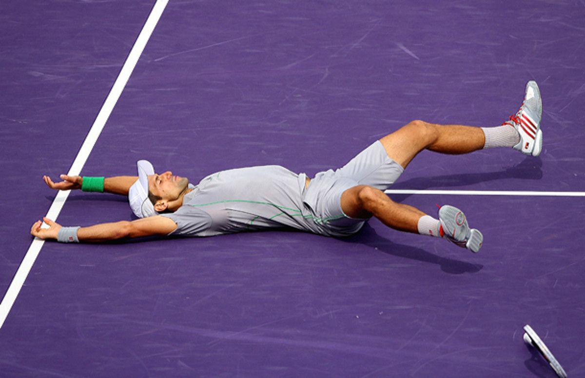 Novak Djokovic celebrates after winning his fourth Sony Open title.