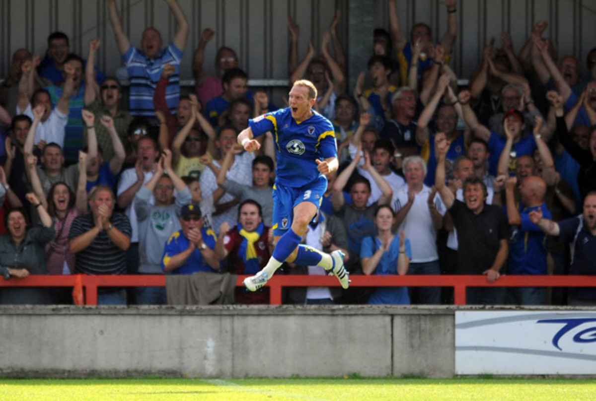 Wimbledon's Gareth Gwillim celebrates scoring against Port Vale at the Cherry Red Records Fans' Stadium.
