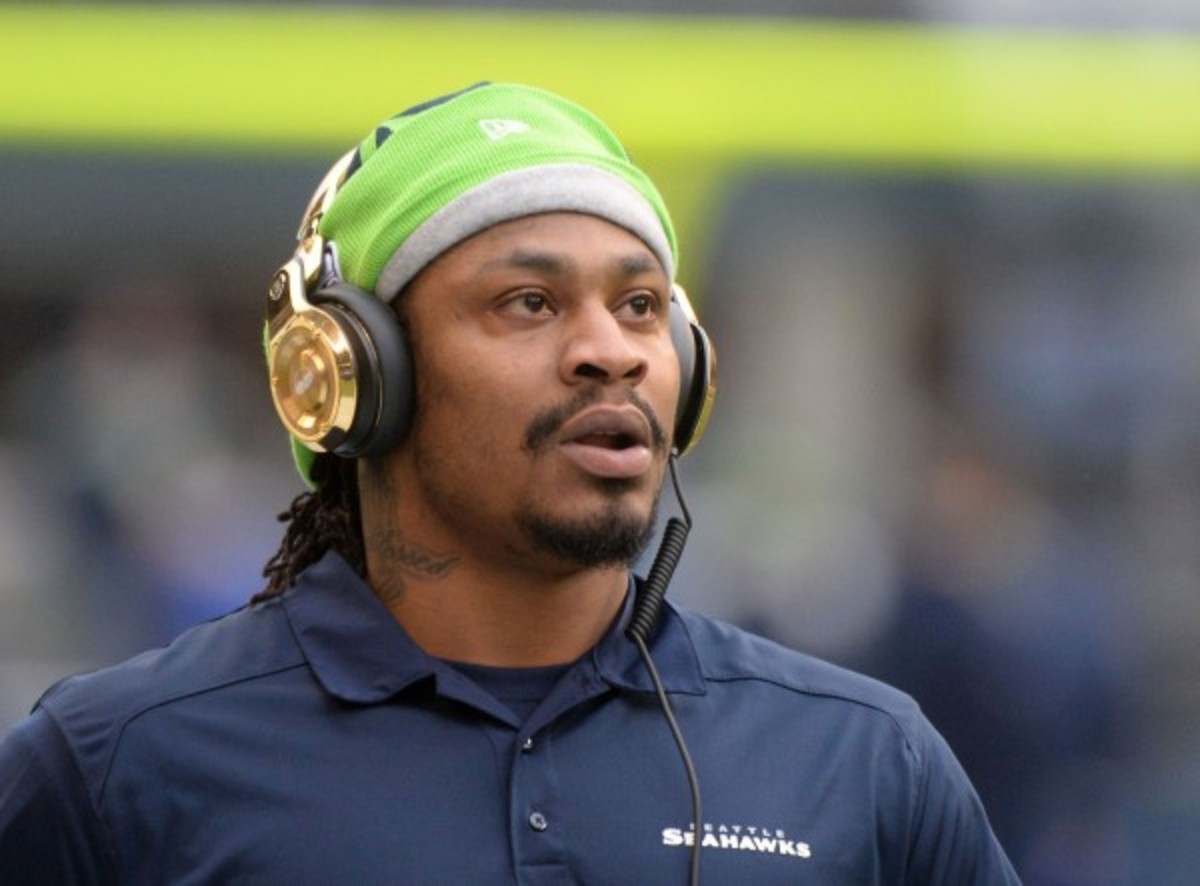Marshawn Lynch had a career high 14 total touchdowns last season. (Tacoma News Tribune/Getty Images)