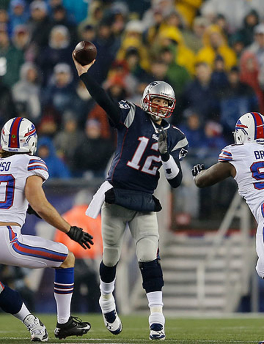 Despite facing varying looks and consistent pressure, Brady's Patriots swept the Bills last season. (Jim Rogash/Getty Images)