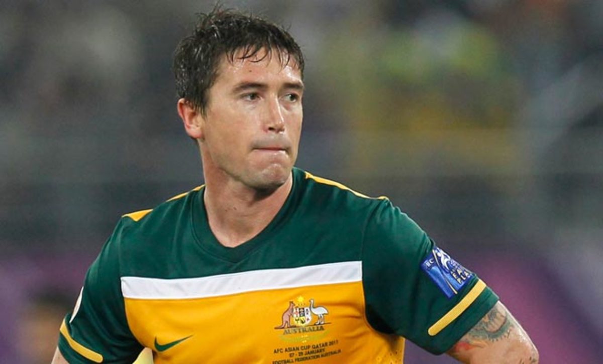 Harry Kewell will not appear at the 2014 World Cup with Australia after announcing his retirement.