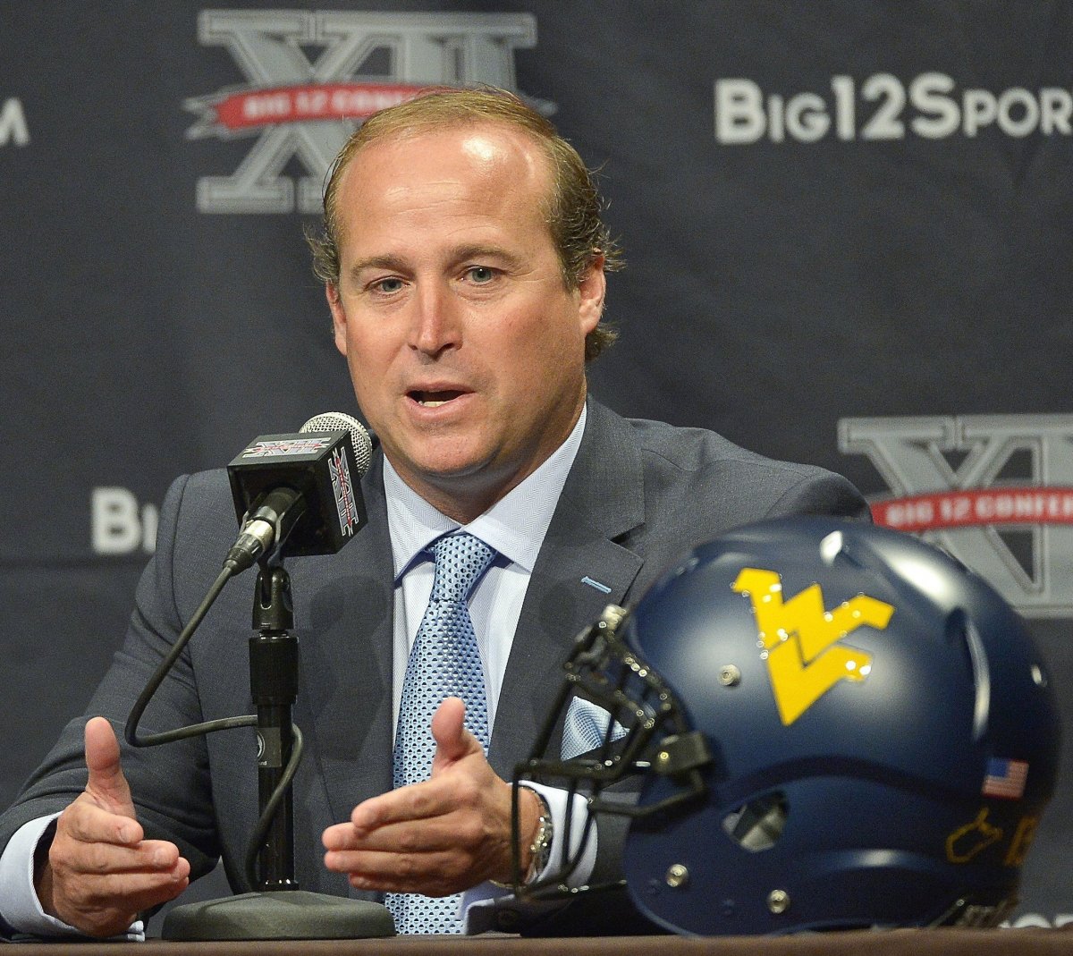 West Virginia coach Dana Holgorsen says recruiting involves lying