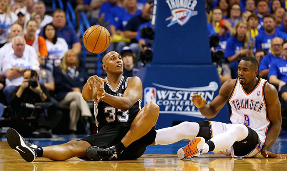 Spurs reserve Boris Diaw (left) has made plays from everywhere -- even while seated -- in the playoffs.