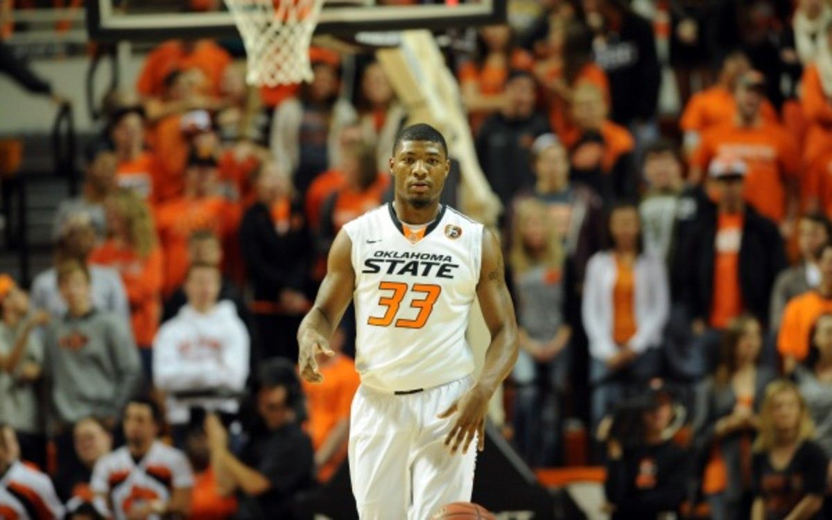 OSU guard Marcus Smart is averaging 20 points and four rebounds this season. (AP Photo/Brody Schmidt)
