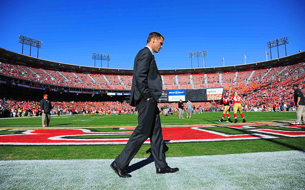 Baalke on the field at Candlestick Park before a December 2011 game. (Kyle Terada/US PRESSWIRE)