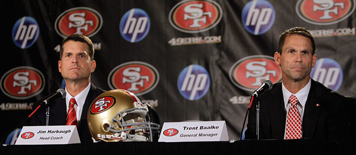 The 49ers’ coach and GM at a press conference in January 2011. (Ben Margot/AP)