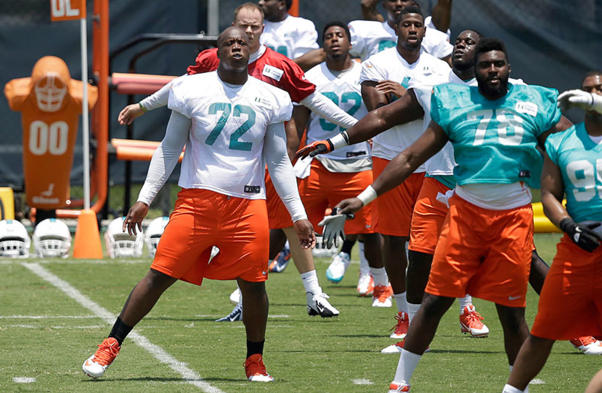 The Dolphins expect rookie Ju'Wuan James (72) to be a long-term answer at tackle. (Wilfredo Lee/AP)