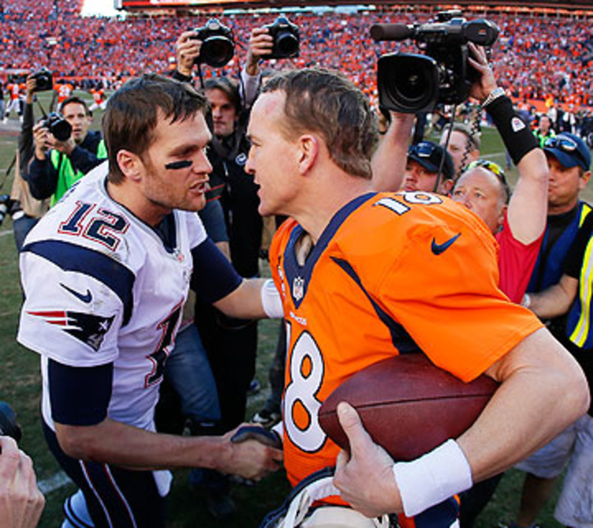 Peyton Manning's Broncos got the best of Brady's Patriots in the AFC title game. (Kevin C. Cox/Getty Images)