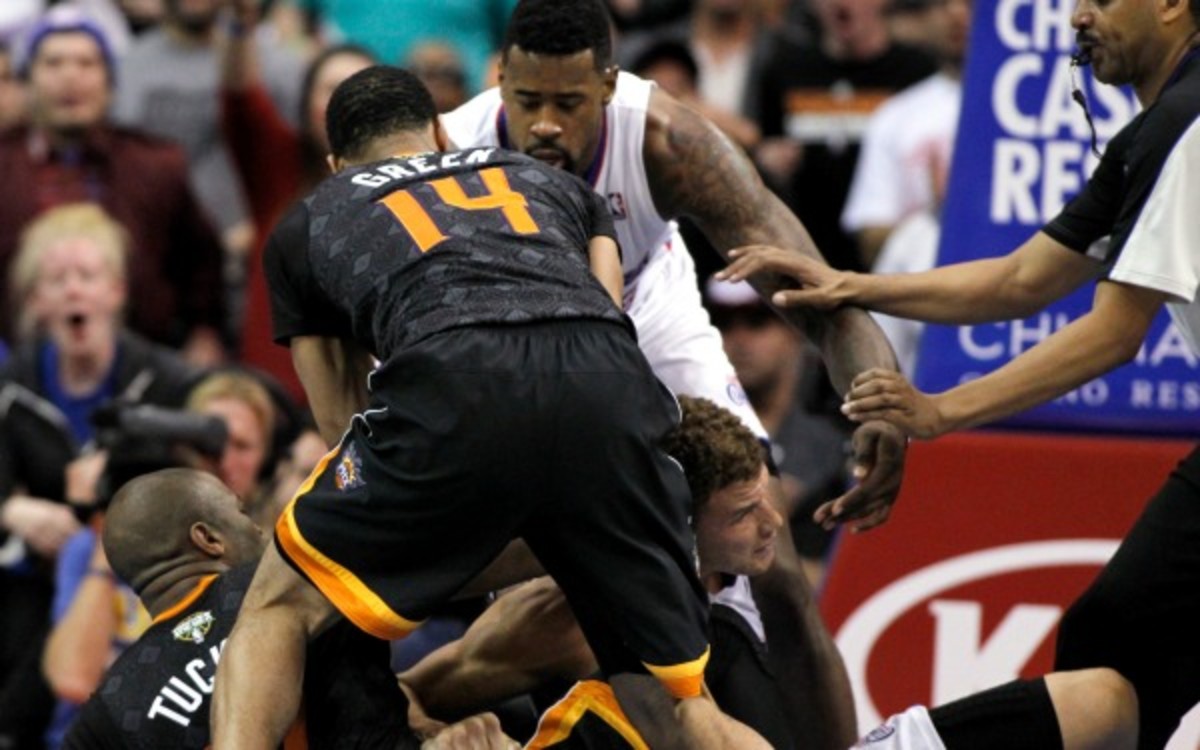 Suns forward P.J. Tucker was ejected from the game after this altercation with Blake Griffin. (AP Photo/Alex Gallardo)