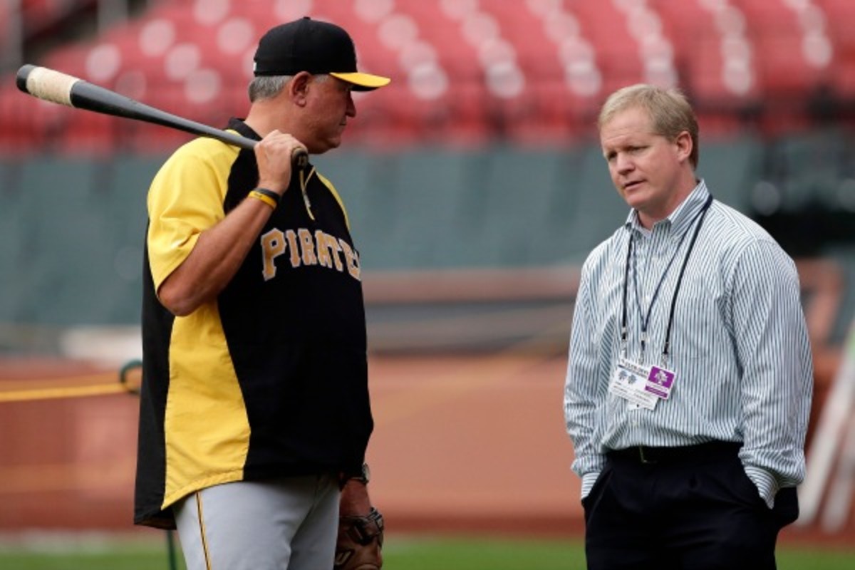 Clint Hurdle (left) and Neal Huntington (right). (Charlie Riedel/AP Images)